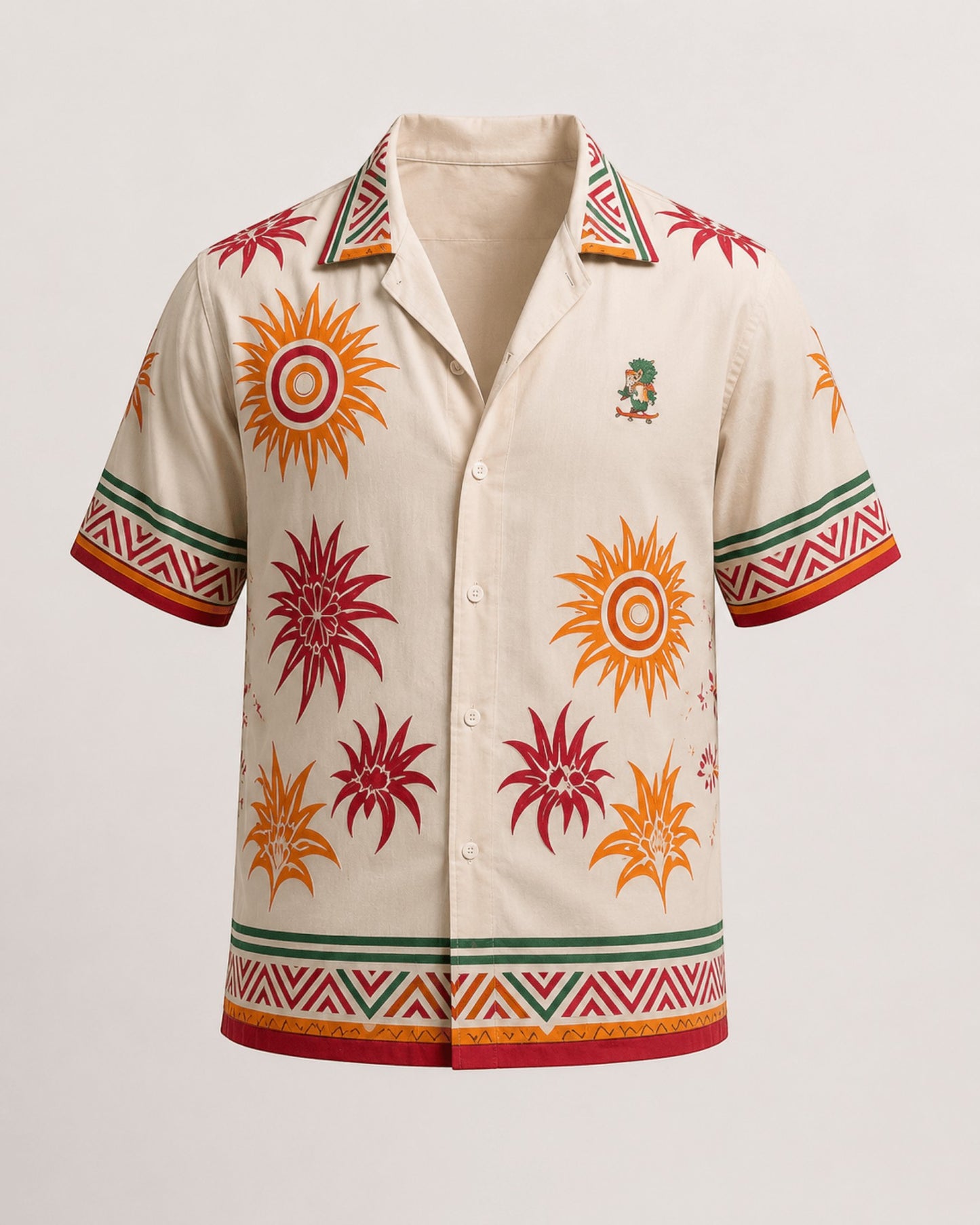 Retrooo.com Hawaiian shirt in cream with red and orange sun patterns, green geometric borders, and Quetzalcoatl patch.