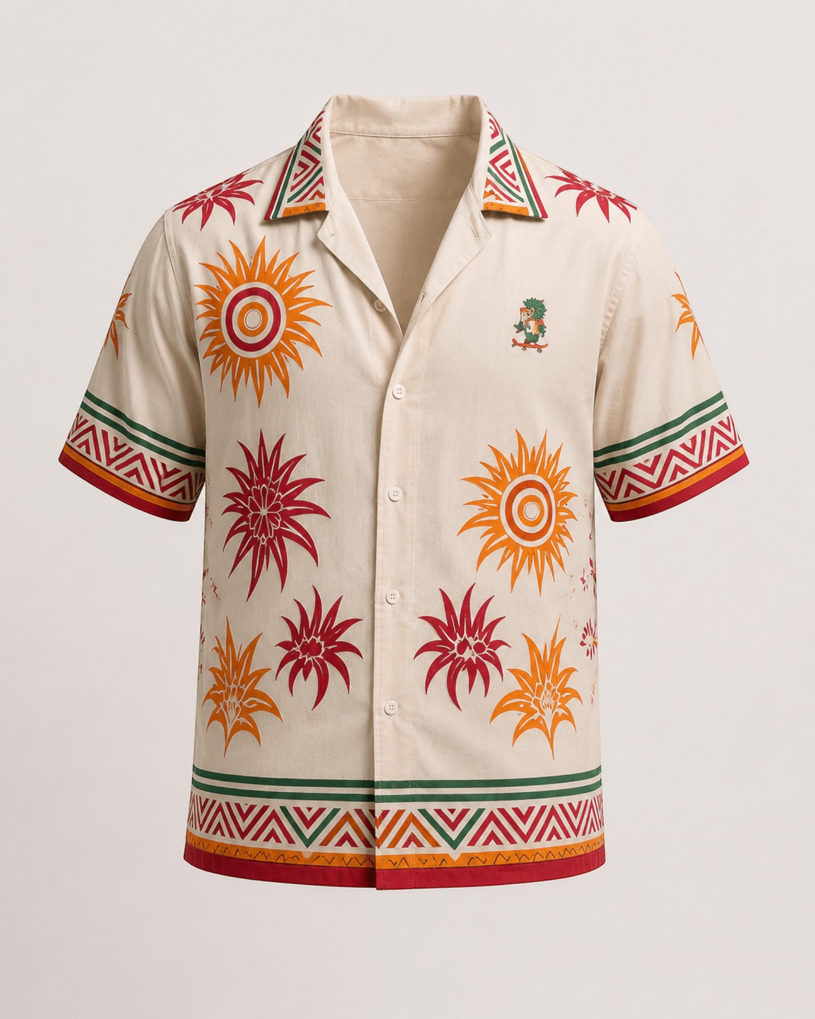Retrooo.com Hawaiian shirt in cream with red and orange sun patterns, green geometric borders, and Quetzalcoatl patch.